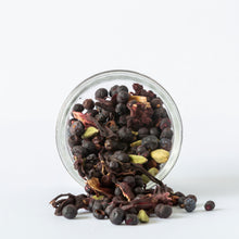 Load image into Gallery viewer, G&amp;T botanicals mix - gin and tonic garnish mix spilling out of a jar.
