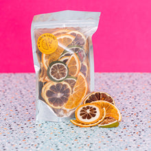Load image into Gallery viewer, Summer Thyme Co Dehydrated limes, lemons and oranges in a bag of Dehydrated Citrus Mix.
