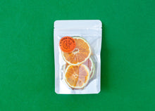 Load image into Gallery viewer, A small pack of dehydrated Valencia Oranges.
