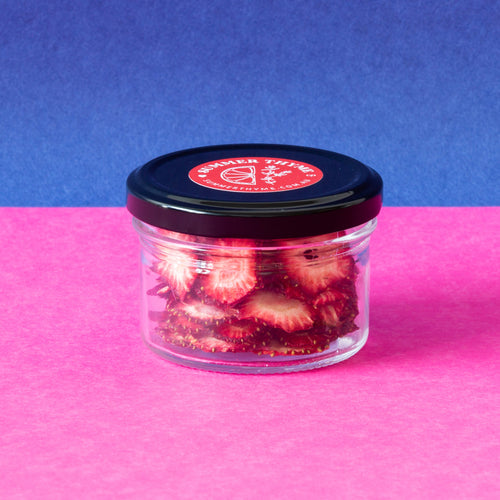 Small jar of dehydrated strawberries.